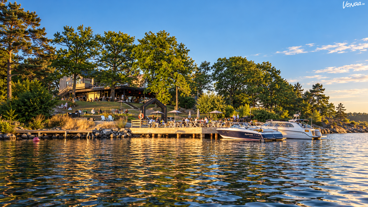 The Old Smokehouse waterfront restaurant with boats moored at its jetty